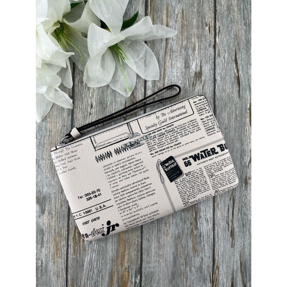 Coach Large Corner Zip Wristlet With Newspaper Print Pebbled Leather Bag